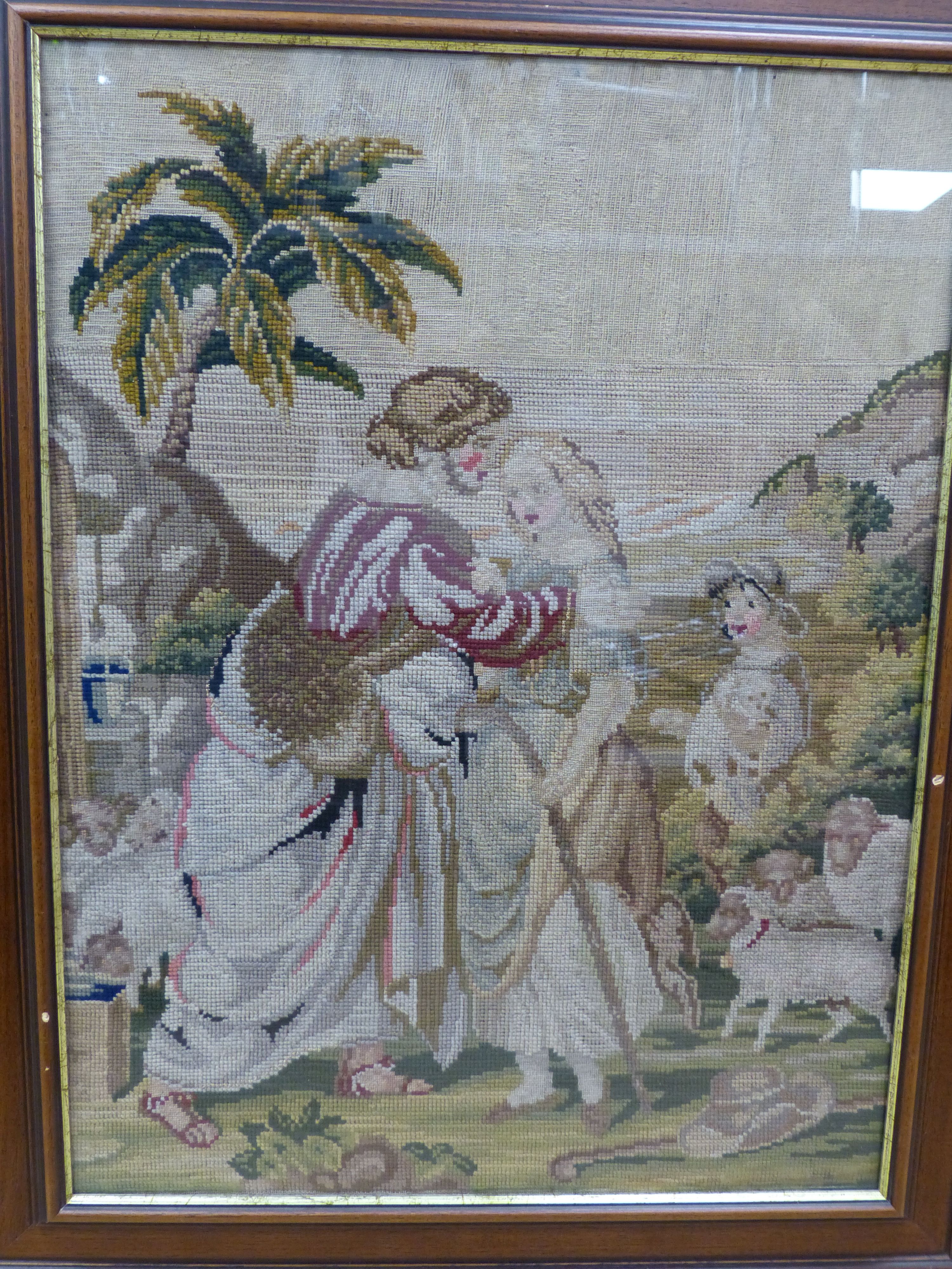 A Victorian woolwork picture depicting Rebecca at the well, framed, 59 x 45cm excl. frame
